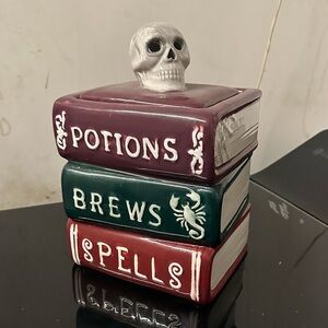 Skull and Book Stack Decor in Burgundy, Green, and White Cookie Jar
